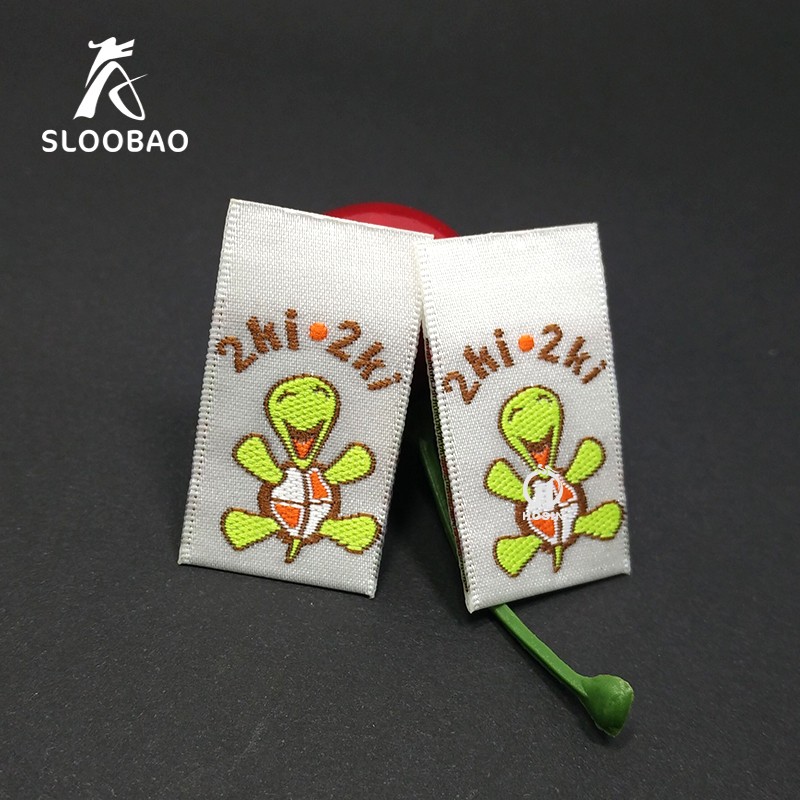 カスタマイズされた独自のロゴメインタグ織ラベル洗える衣類ラベ - Baby Clothing Labels のレビューと価格